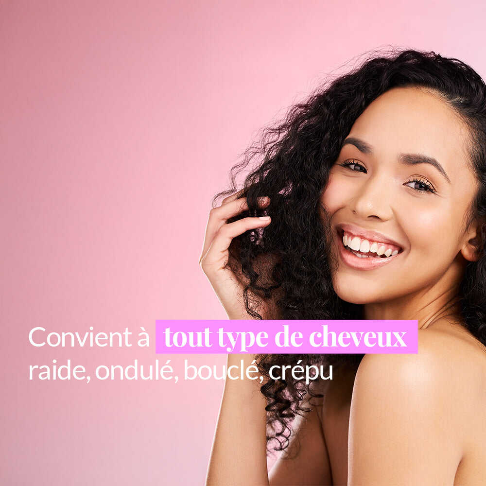 Femme souriante avec cheveux naturels, illustration du produit convenant à tout type de cheveux Les Confiantes.